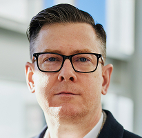 Führungskraft eines Krypto-Handelsunternehmens, CEO Alexander Hughes im Porträt
